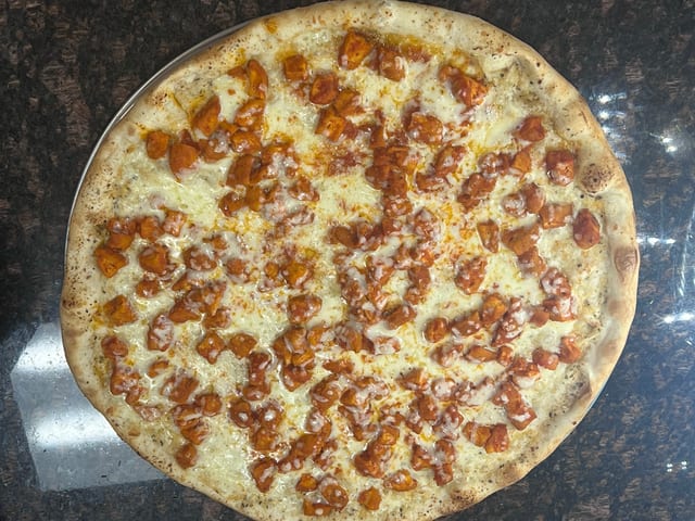 Chicken Parmigiana Pizza.